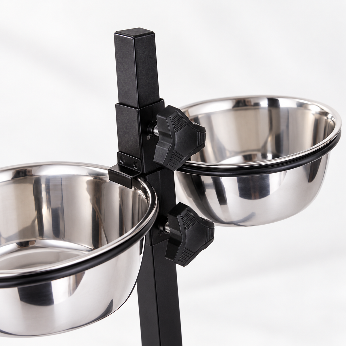 Close-up of adjustable knobs on elevated double dog bowl stand
