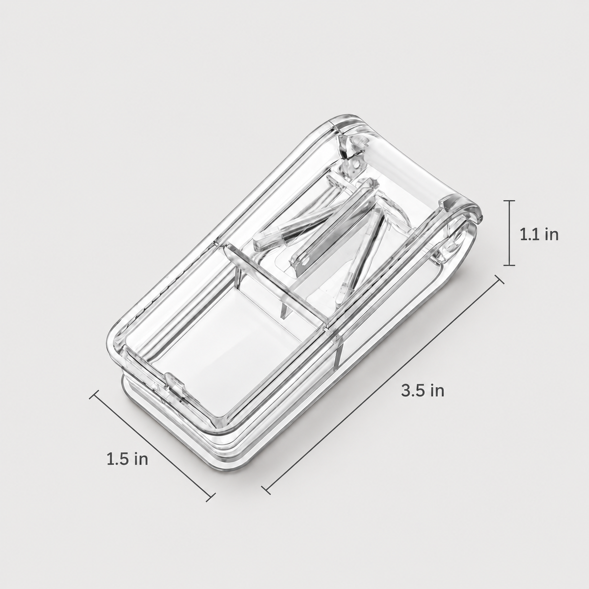 Pet pill cutter used for dog medication beside a small dog and water glass