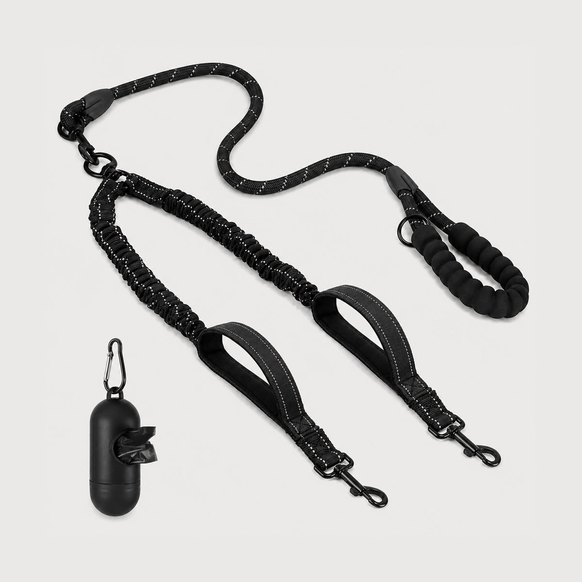 Reflective dual dog leash with shock-absorbing bungee leads for walking two dogs.