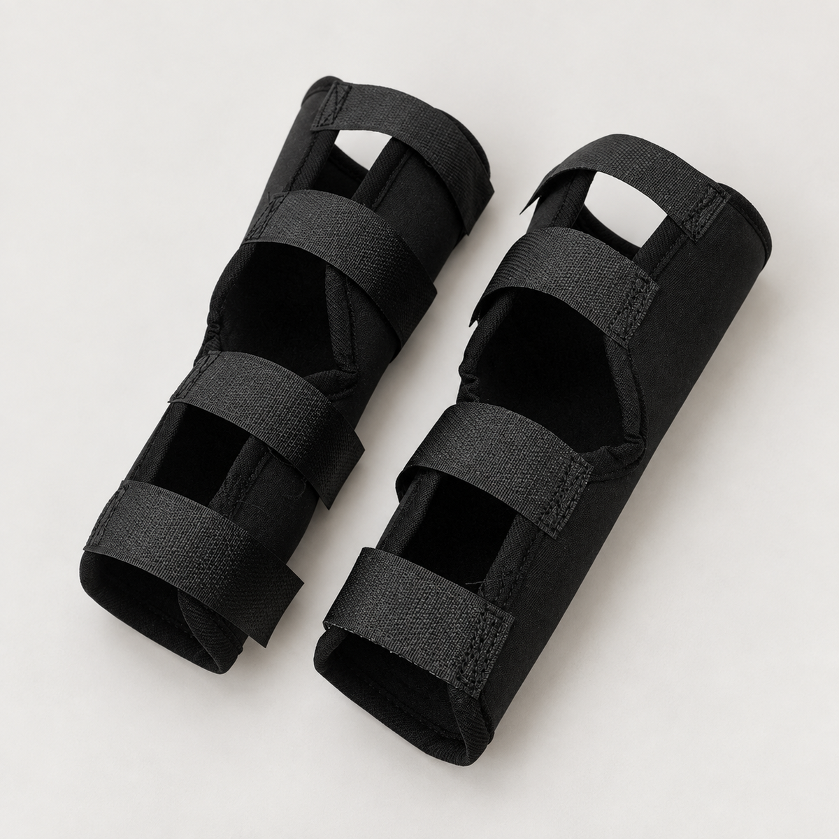Pair of black adjustable neoprene dog elbow support braces
