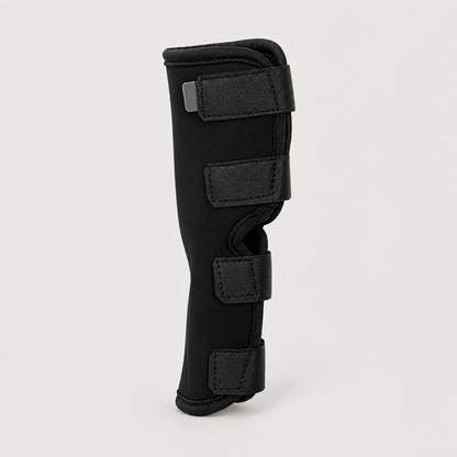 Black adjustable dog elbow support brace side view with hook-and-loop straps