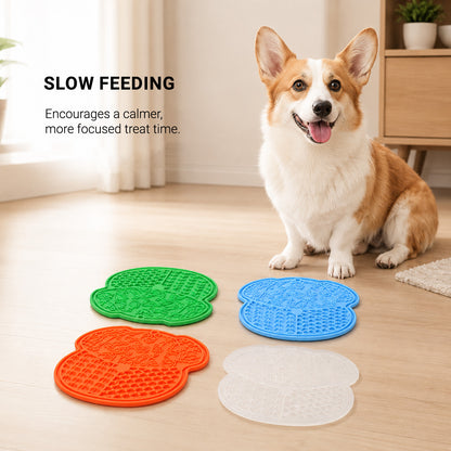 Dog using a CalmLick slow-feeding lick mat during calm treat time