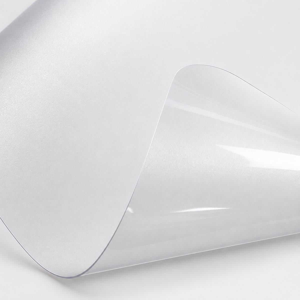 Close-up of ClearGuard frosted PVC pet floor protector mat showing flexible transparent material
