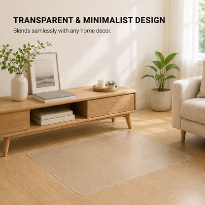 ClearGuard transparent minimalist pet floor mat blending into a modern warm-toned living room