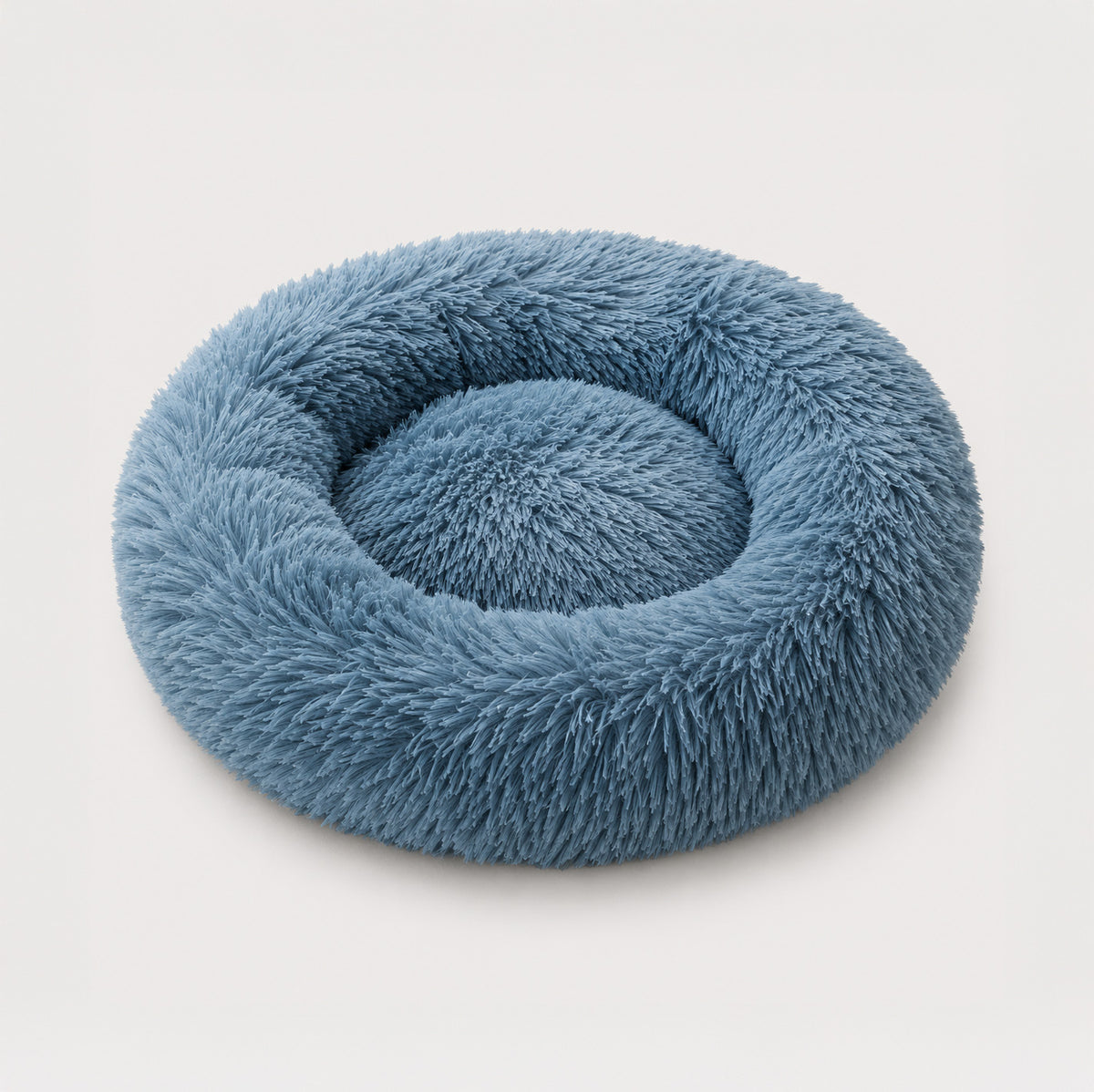 CloudNest plush round dog bed with soft raised edge for cozy daily rest
