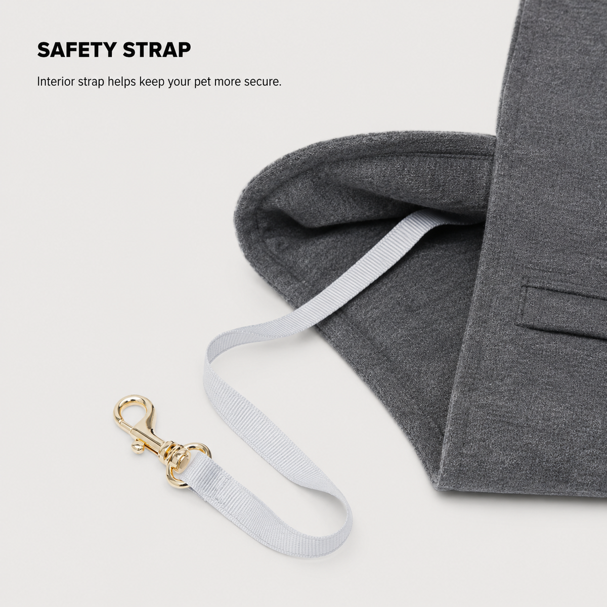 Interior safety strap on ComfortCarry pet sling carrier