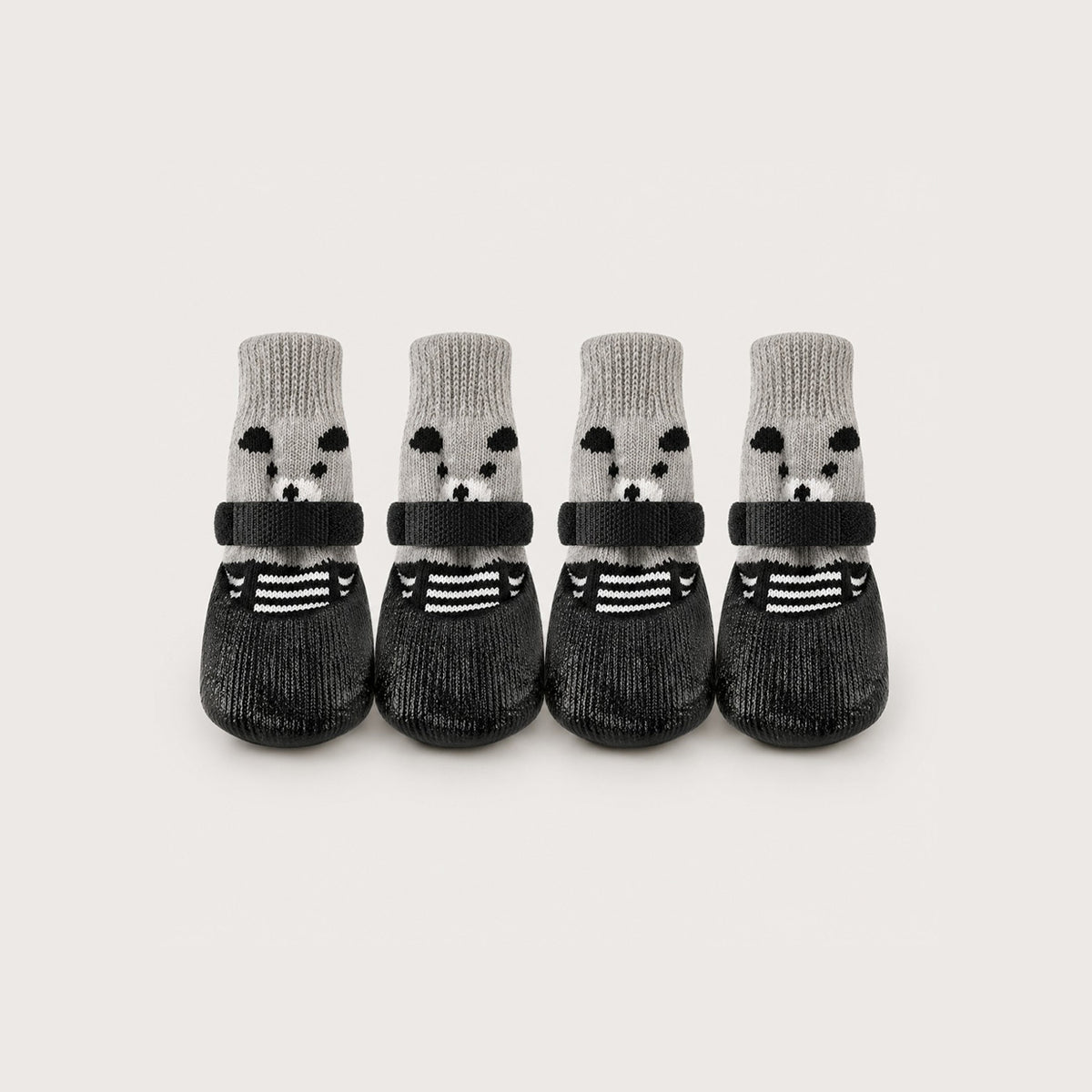 BarkTango CozyGrip knit dog boots in black with soft knit cuffs and non-slip rubber soles