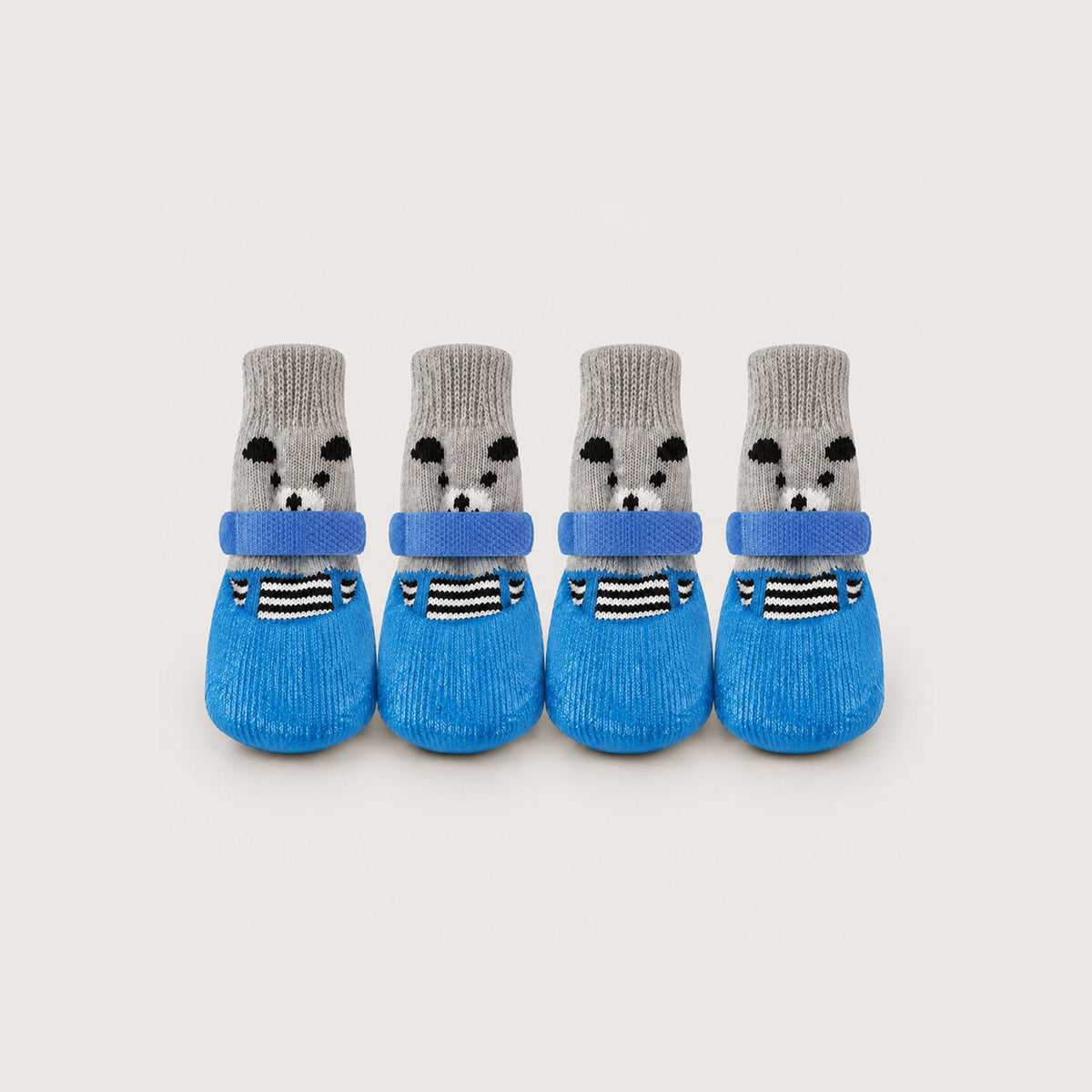 BarkTango CozyGrip knit dog boots in blue with adjustable straps and rubber-coated soles