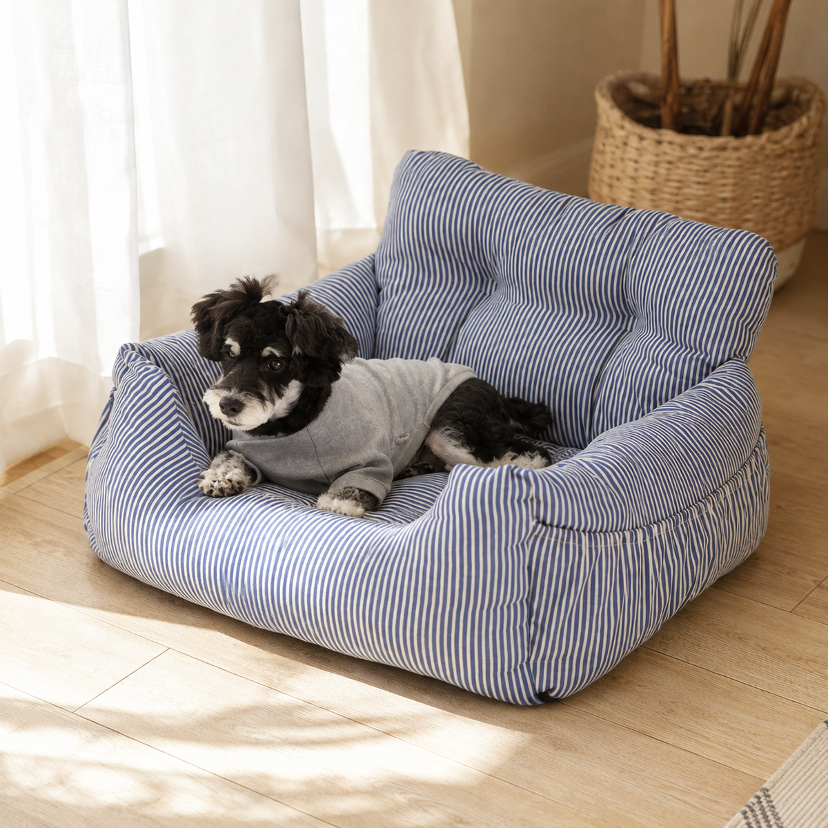 CozyRide striped dog car seat bed used as a cozy pet bed at home
