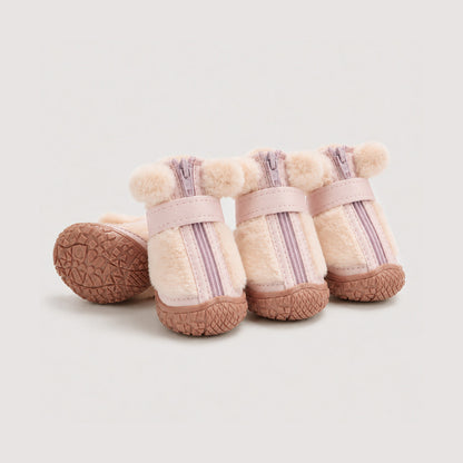 CozyStep plush winter dog boots in pink with textured anti-slip soles