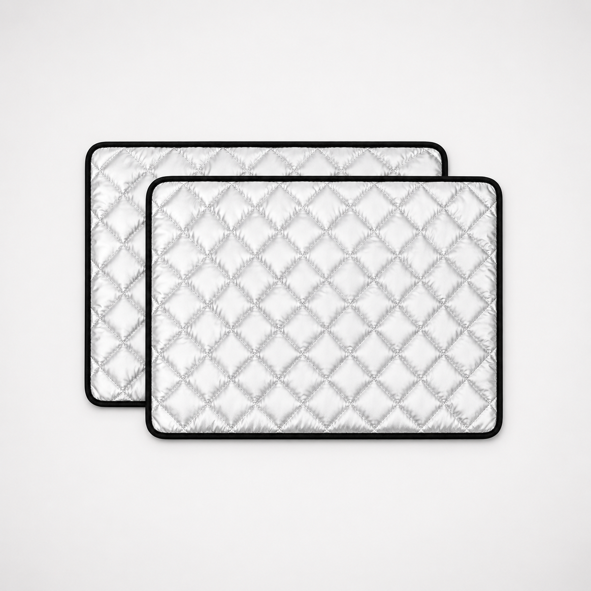 Two DryNest washable waterproof pet pads in silver quilted design with black trim, square product image