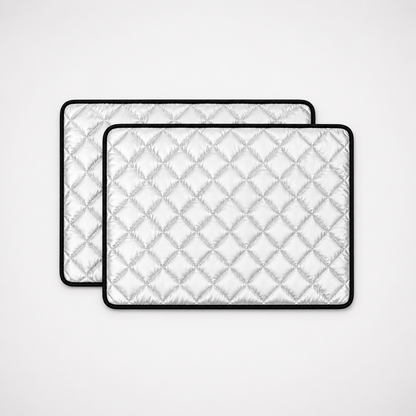 Two DryNest washable waterproof pet pads in silver quilted design with black trim, square product image