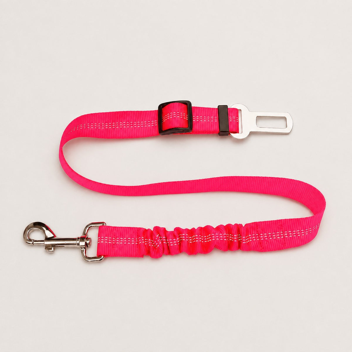 Pink FlexRide reflective dog car seat belt with adjustable bungee tether