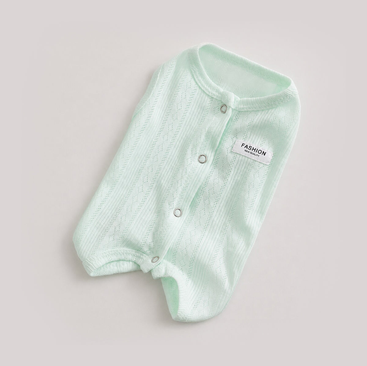 Mint GentleGuard dog recovery suit with breathable knit fabric and snap closures