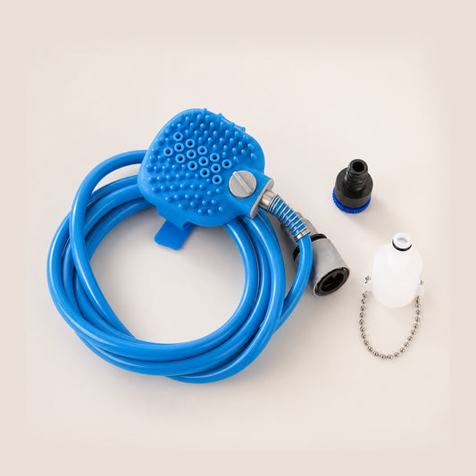 Handheld dog shower and massage brush for gentle bathing rinsing and scrubbing