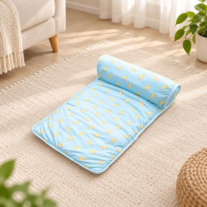 Blue ice silk cooling pet mat with banana print and padded pillow edge
