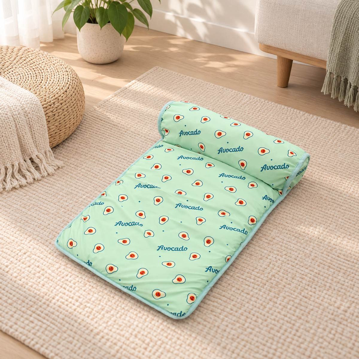Green ice silk cooling pet mat with avocado print and padded pillow edge