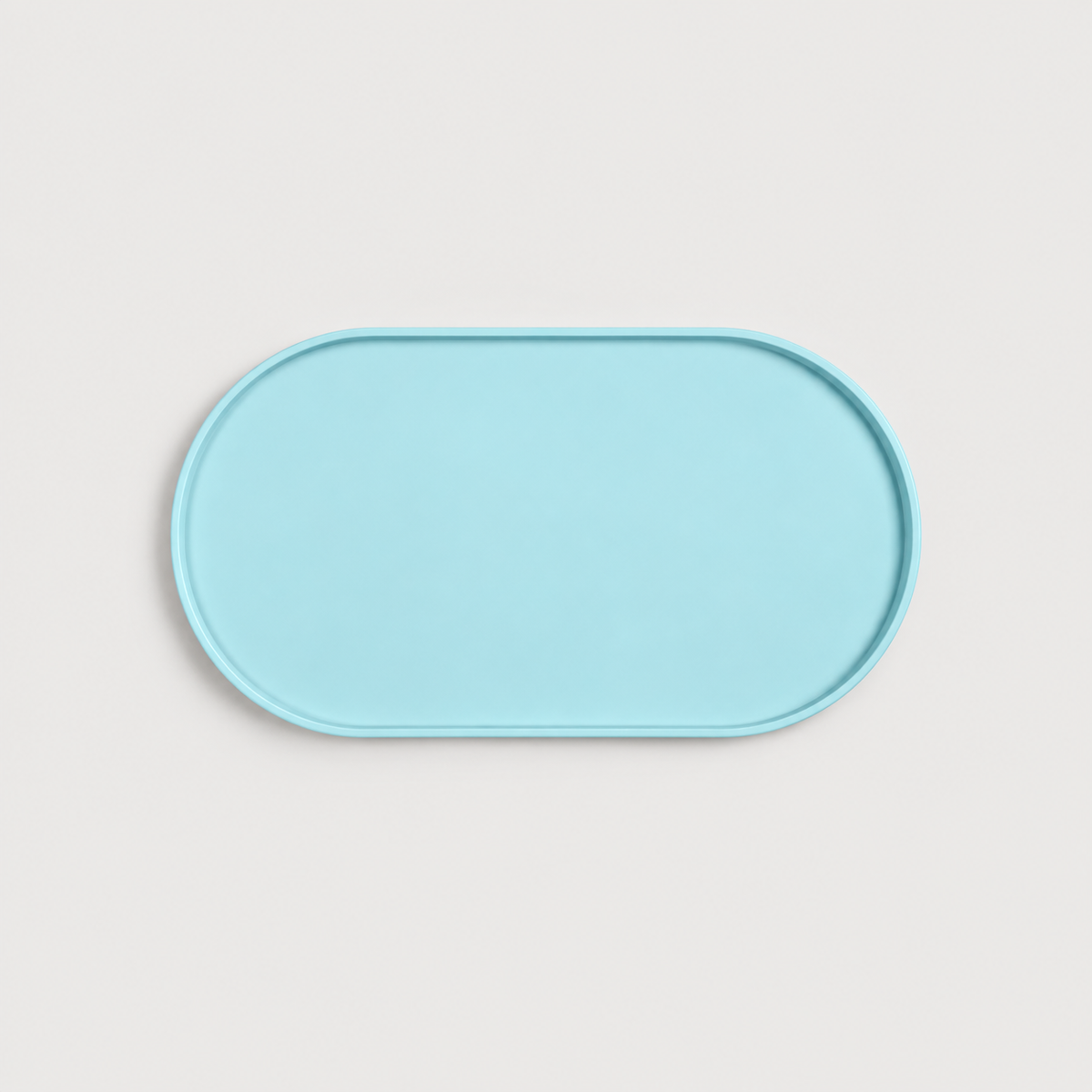 Light blue non-slip silicone dog feeding mat with raised edge