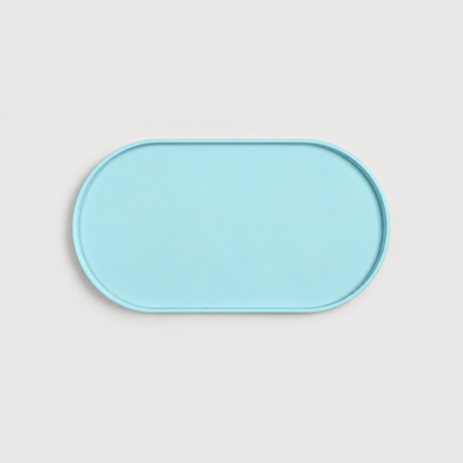 Light blue non-slip silicone dog feeding mat with raised edge