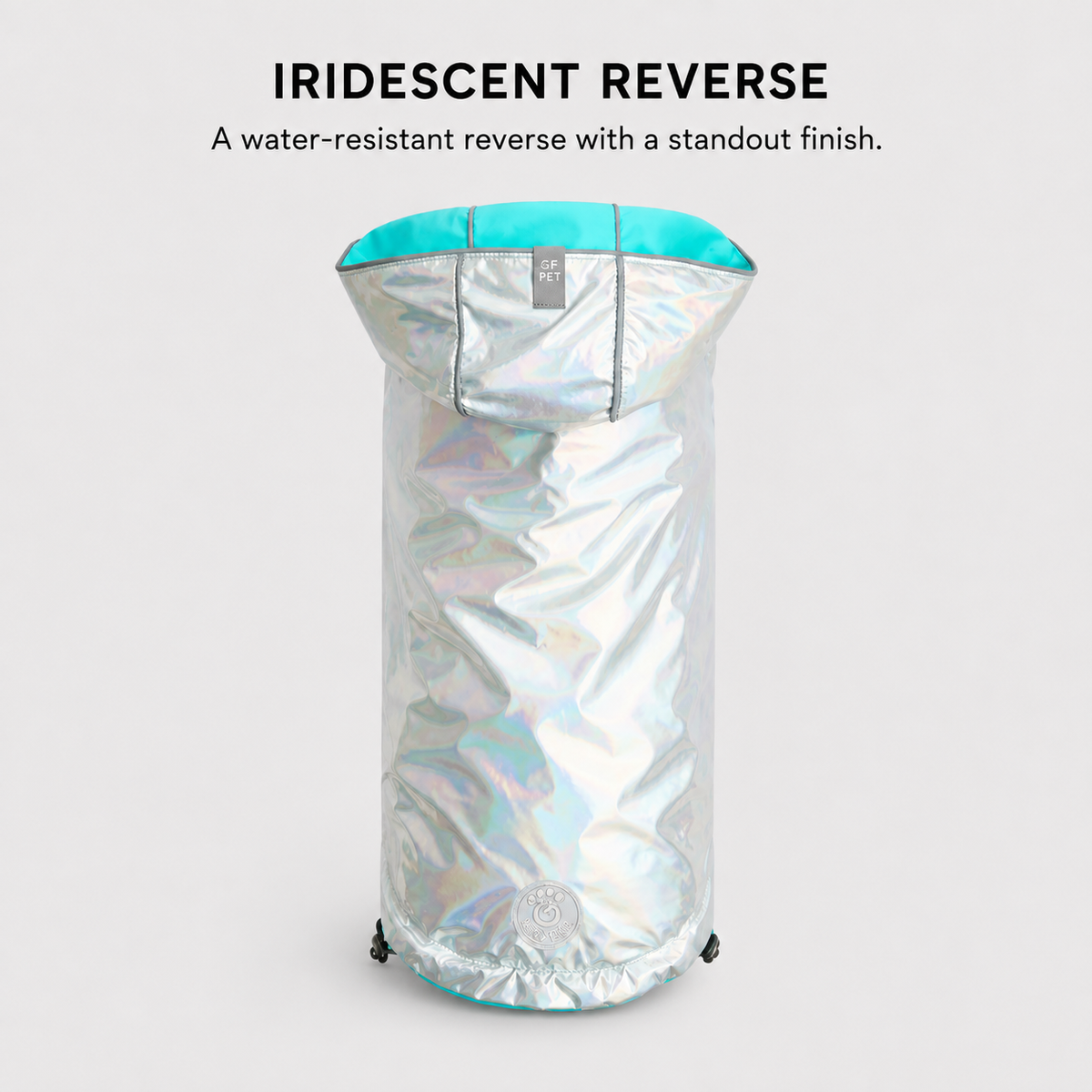 Adjustable hood on the neon aqua waterproof dog raincoat.