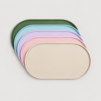 Non-slip silicone dog feeding mats shown in five available colors