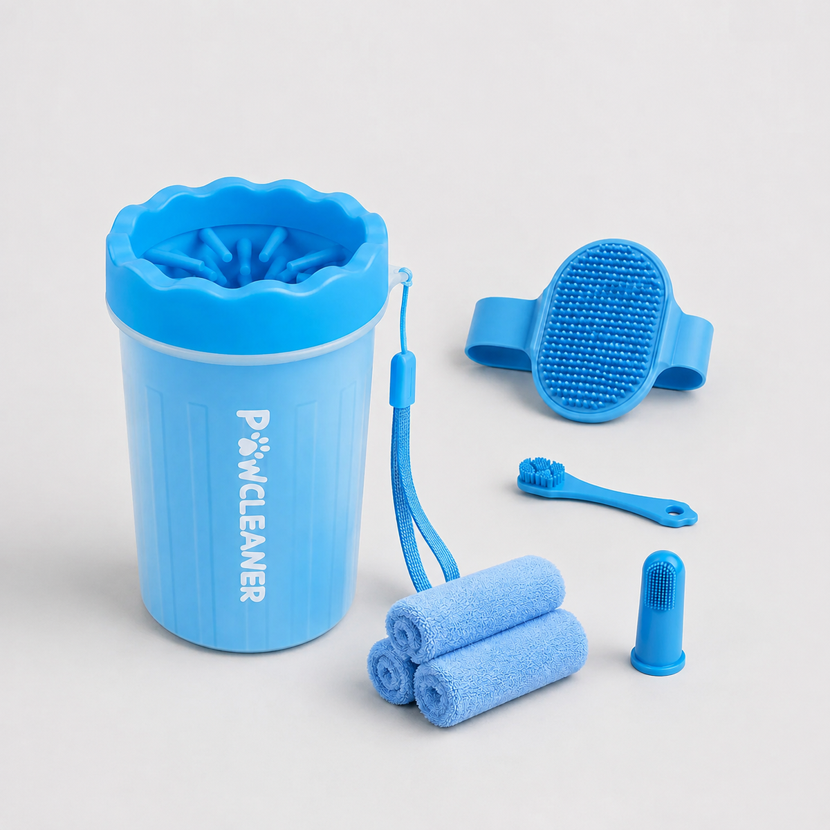 PawFresh 7-in-1 dog cleaning kit with blue paw washer, grooming brush, toothbrushes, and absorbent towels