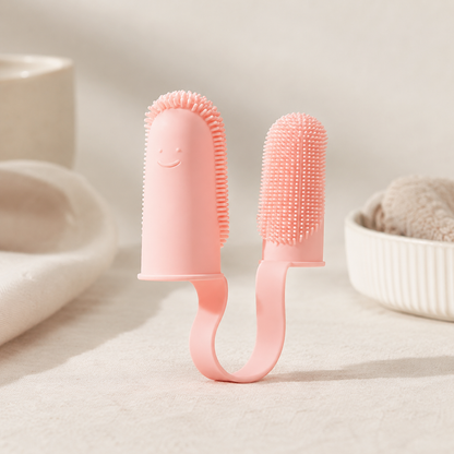 Pink double-finger dog dental brush with soft wraparound bristles