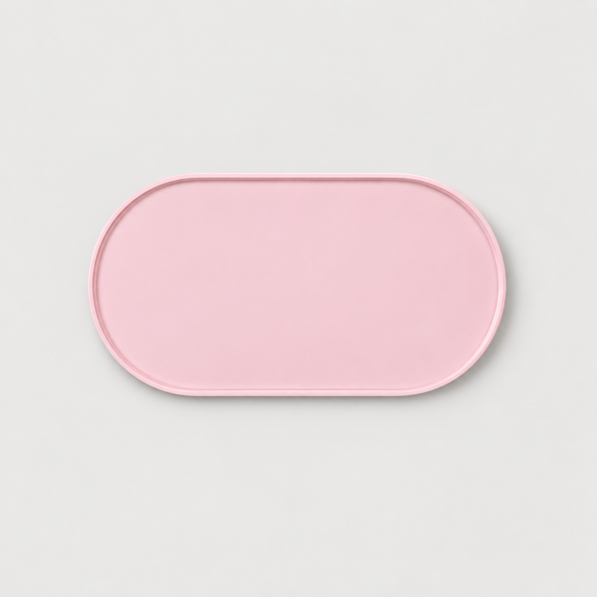 Pink non-slip silicone dog feeding mat with raised edge