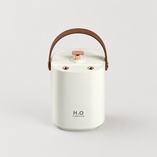QuietMist rechargeable humidifier with dual mist outlets and carry handle