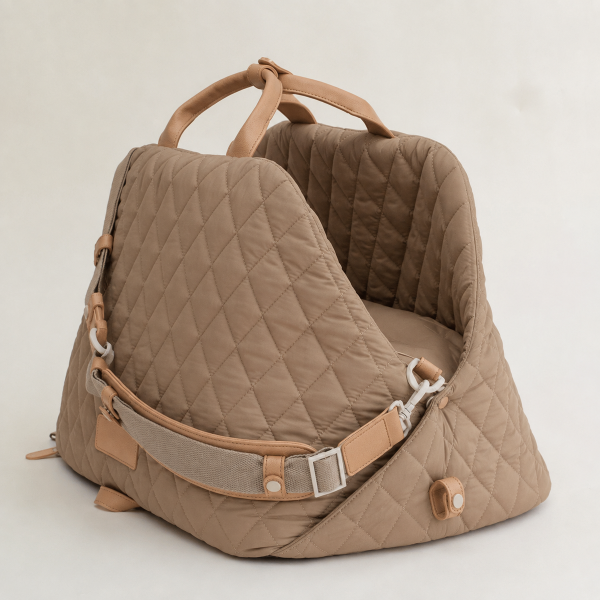 Khaki quilted pet carrier interior with padded sides and shoulder strap