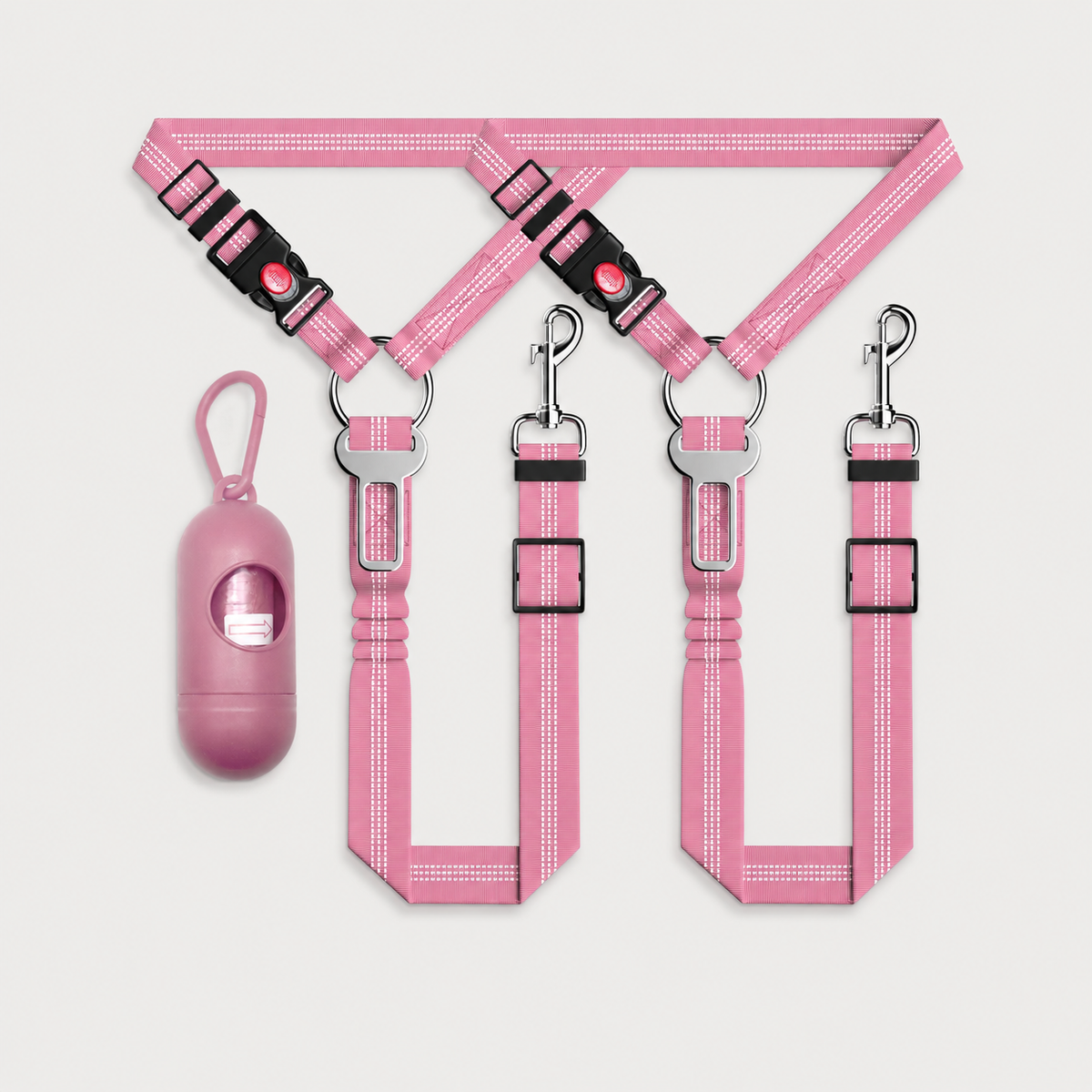 Light pink SafeRide 3-piece reflective dog car seat belt set with adjustable tethers