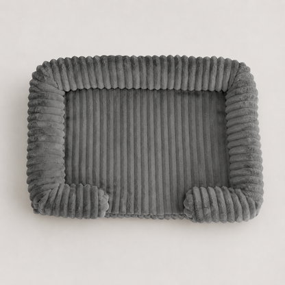 Dark gray SoftHaven washable ribbed bolster dog bed for everyday lounging