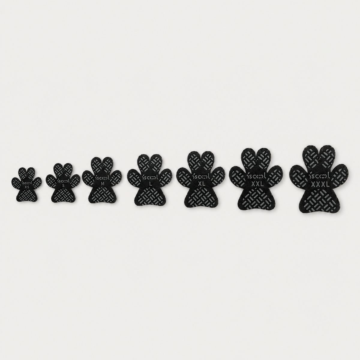 SteadyStep self-adhesive anti-slip dog paw grips shown in sizes XS through XXXL