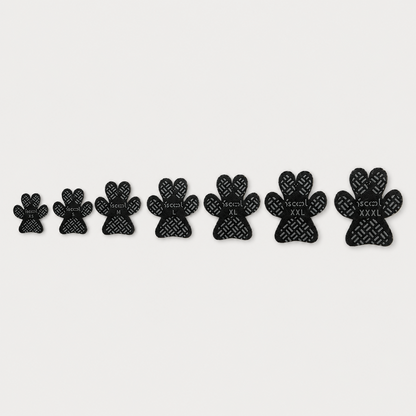 SteadyStep self-adhesive anti-slip dog paw grips shown in sizes XS through XXXL