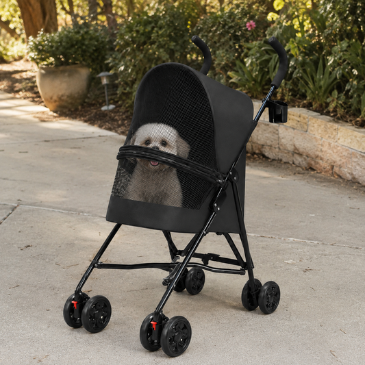 Small dog riding in the SwiftRide lightweight foldable pet stroller during an everyday outdoor outing